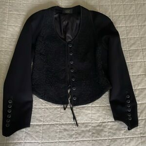 Bolero style wool jacket by Cynthia Steffe with tie up detail on back.